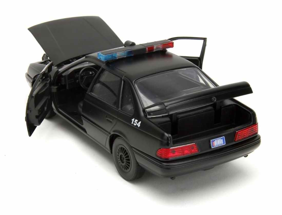 Voiture police FORD Taurus 1/24 Métal Avec Figurine Robocop